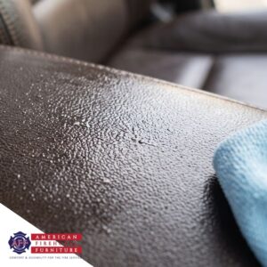 A detailed close-up showing leather fabric upholstery maintaining a damp, sanitized surface after cleaning.